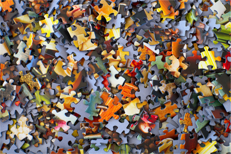 A pile of loose puzzle pieces