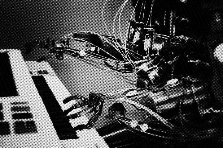 Robot playing a piano